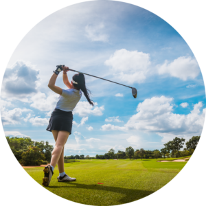 Professional woman golfer teeing golf in golf tournament competition at golf course for winner.